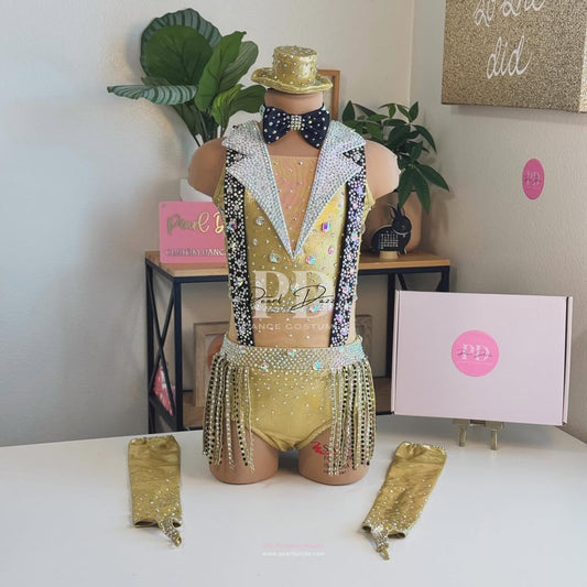 Gold ringmaster jazz dance costume with rhinestone lapel collar, crystal suspenders, gold leotard base, fringe hips, bow tie, gloves, and mini top hat by Pearl Dazzle.
